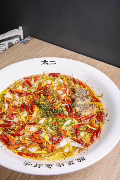 乐动体育太二酸菜鱼东北首店沈阳万象城劲爽开市